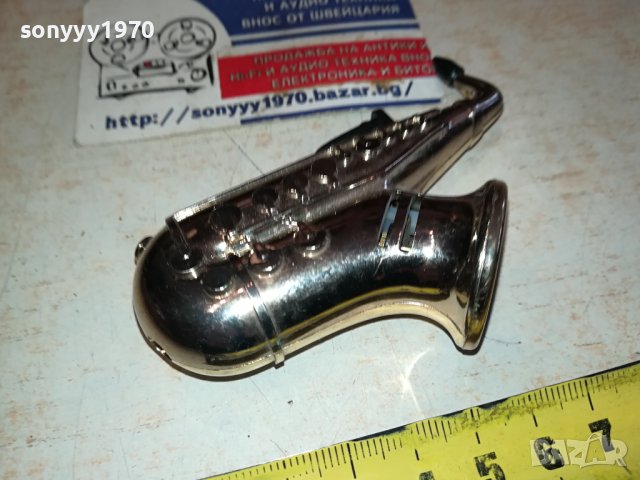 САКСОФОН-НЕМЕТАЛНА ЗАПАЛКА ОТ ГЕРМАНИЯ 2512231014, снимка 10 - Антикварни и старинни предмети - 43541574