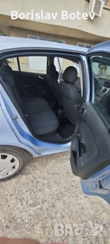 Opel Corsa D 1.3cdti, снимка 15 - Автомобили и джипове - 53601509
