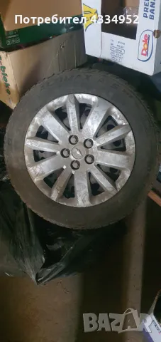 Железни джанти за Шевролет Круз 16" със зимни гуми и оригинални тазове, снимка 5 - Гуми и джанти - 48427866