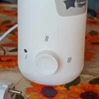 Tommee Tippee уред за затопляне на мляко и храна, снимка 1 - Прибори, съдове, шишета и биберони - 43802794
