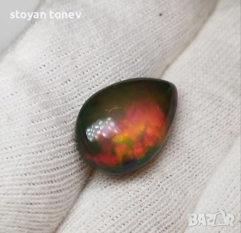 Голям черен опал с патерн Медна пита и впечатляващи отблясъци 9.22кт.! Нов!, снимка 9 - Други - 50925535