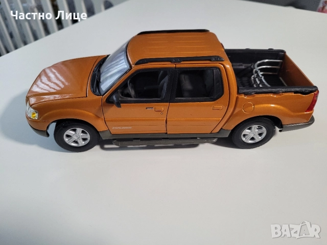 Модел Ford Explorer Sport Trac Orange Maisto 1/18 , снимка 2 - Коли, камиони, мотори, писти - 52344129