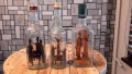 Три броя стъклени шишета със интересни фигури  30лв за брой , снимка 1
