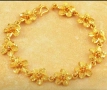 Нежна гривна цветя от 9к попълнено злато 20 лв., снимка 2