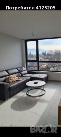 Ъглов диван, удобен и практичен. Изработен от качествен текстил в тъмно сив цвят. Разполага с функ