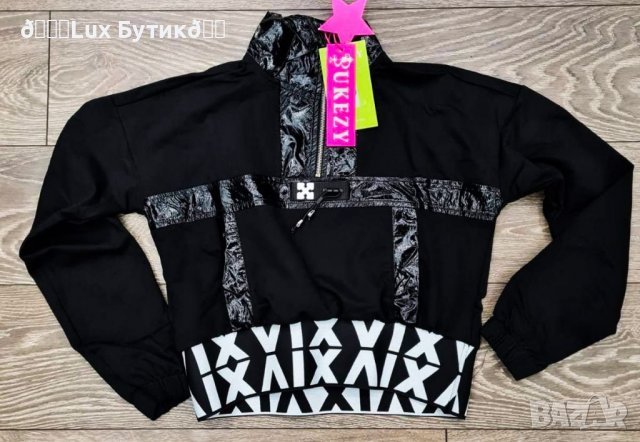 Дамска екстравагантна спортно елегантна блуза с цип 