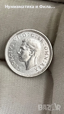 Сребърна монета 3 пенса  1940 Сребро /сив цвят/. Емблема