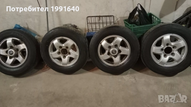 Гуми 205/70/15 с лети джанти 15 цола Киа Спортидж