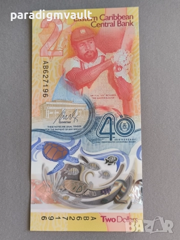 Банкнота - Източни Кариби - 2 долара (юбилейна) UNC | 2023г., снимка 4 - Нумизматика и бонистика - 52254665