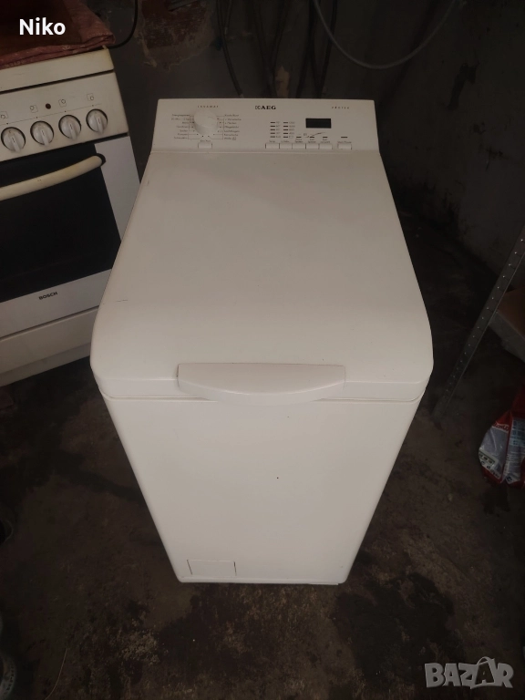 Пералня с горно зареждане AEG  A+++, снимка 1