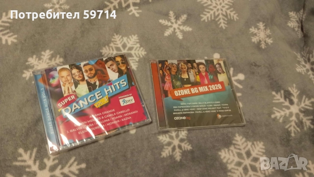 Два неразопаковани диска с музика