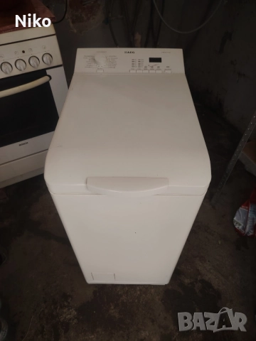 Пералня с горно зареждане AEG  A+++