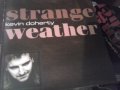 Kevin Doherty – Strange Weather оригинален диск, снимка 1 - CD дискове - 43699983