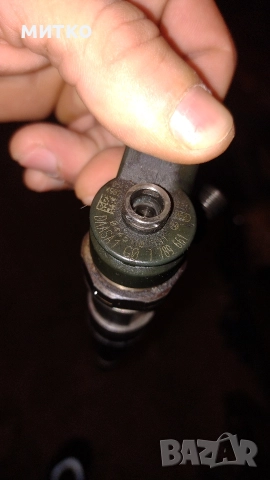 Инжектори дюзи Bosch 7 789 661, снимка 2 - Автомобили и джипове - 52556952