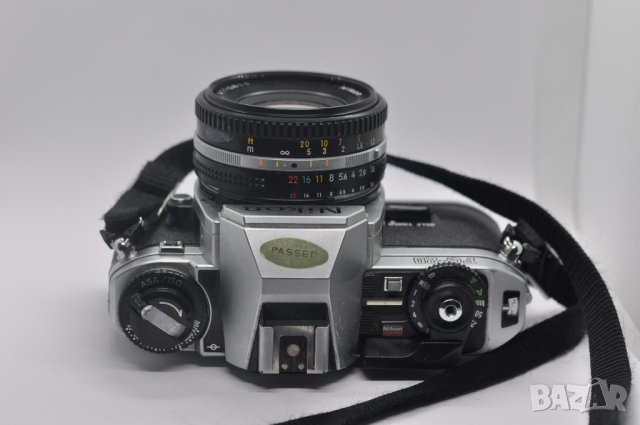 Фотоапарат Nikon FG-20 с обектив Nikkor 50mm f/1.8, снимка 9 - Фотоапарати - 43104294