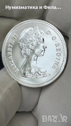 Сребърна монета Канада 1 долар 1980 година , снимка 2 - Нумизматика и бонистика - 52705121