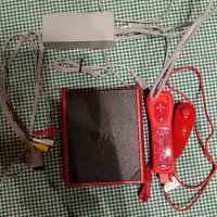 Конзола Nintendo Wii Mini цвят червен , снимка 1 - Игри за Nintendo - 43439209