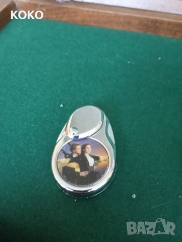 Метална запалка с изображение от филма Титаник