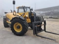 Телескопичен товарач Caterpillar TH407C, снимка 17