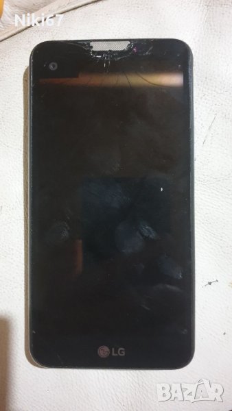 LG K500n  За ремонт или части , снимка 1