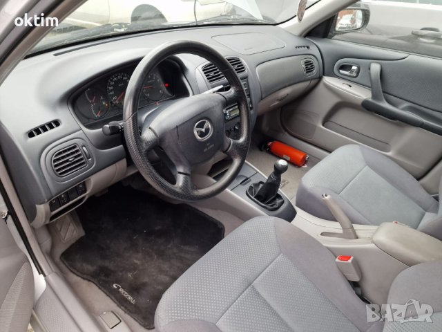 Мазда 323 бензин нова газова инсталация перфектно състояние, снимка 7 - Автомобили и джипове - 40454059