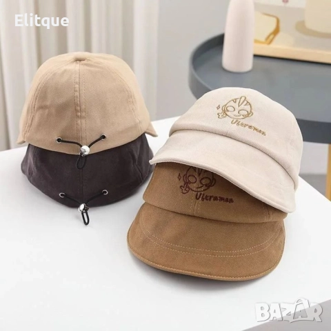 Удобна детска шапка с козирка от мека материя. Обиколката на шапката е 48см, снимка 3 - Други - 52895441