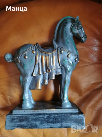 Статуетка на кон