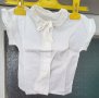 Продавам блуза  2 год Бяла с дантели по яката и ръкавите  къс ръкав , снимка 1 - Детски Блузи и туники - 37889973