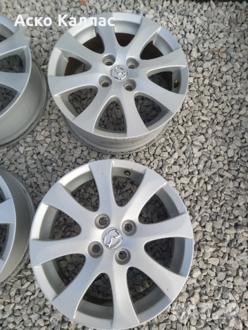 4х100. 15.цола.6j.ET45 оргинални Mazda, снимка 3 - Гуми и джанти - 51829747
