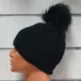 Нова зимна дамска шапка с камъчета отпред и с пух/помпон в черен цвят, снимка 3
