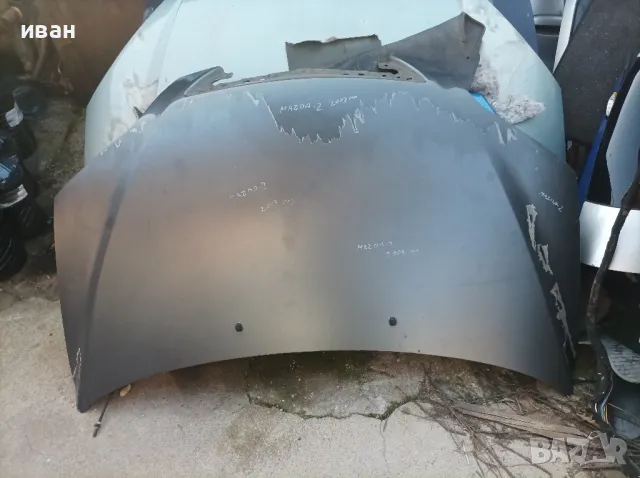 Преден капак за Мазда 2. 2003 год.