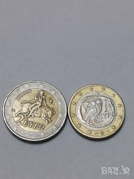 1 и 2 евро от Гърция-2002 г. с буква S в звездата, снимка 1