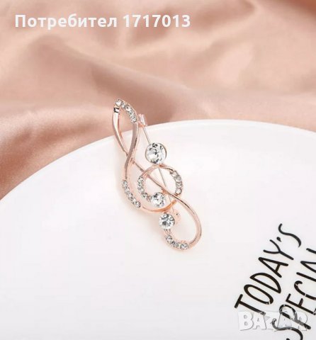 Брошка музикален ключ