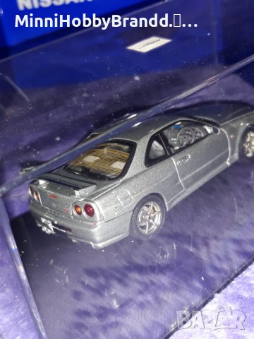 NISSAN  SKYLINE GT-R R 34 V spec AUTOart 1.43  Top Model , снимка 12 - Колекции - 39258739