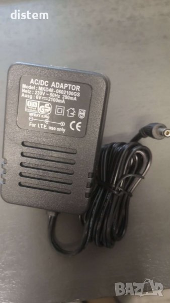 Оригинално захранване AC/DC адаптер Merry King MKD48/0602100GS 6 V/2100mA, снимка 1
