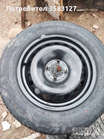 Резервна гума , снимка 1 - Гуми и джанти - 44865533