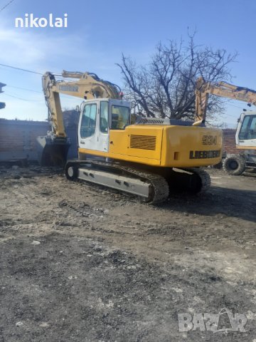 Услуги с багери изкопи събаряне на сгради чук за бетони