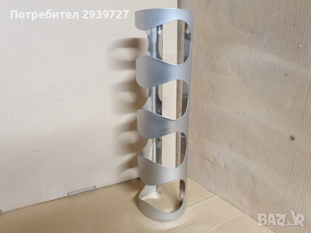 Поставка за бутилки за стена