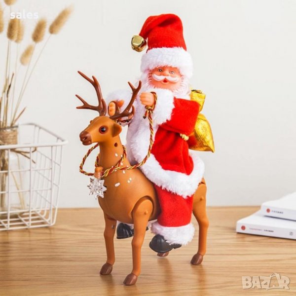 Забавният музикален Дядо Коледа язди еленче., снимка 1