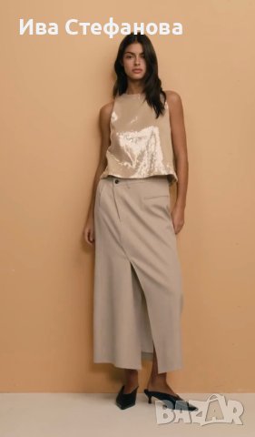 Пола бежова асиметричен акцент  със свободна кройка от елегантна материя с деликатен меланжов десен., снимка 2 - Поли - 44132936