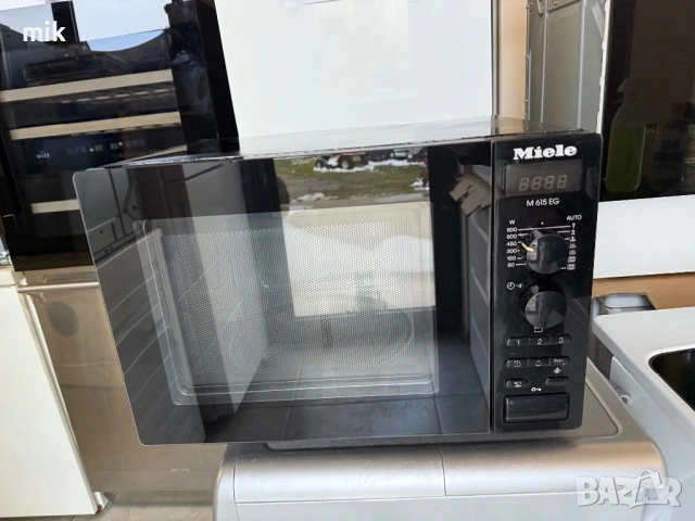Черна микровълнова печка МИеле 