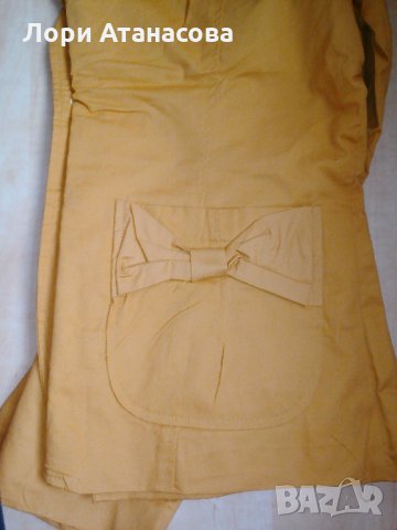 Феерия в Жълто-  пролетно дамско сако от трикотажна материя с дълъг ръкав. 
