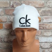 Нова зимна шапка в бял цвят на марката CK, Calvin Klein, снимка 2 - Шапки - 43280762