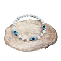 Ластична гривна с кристали и синьо око, снимка 1 - Гривни - 43635038