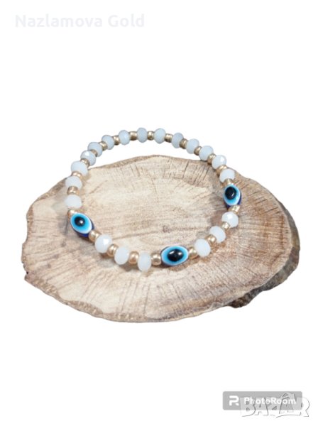Ластична гривна с кристали и синьо око, снимка 1