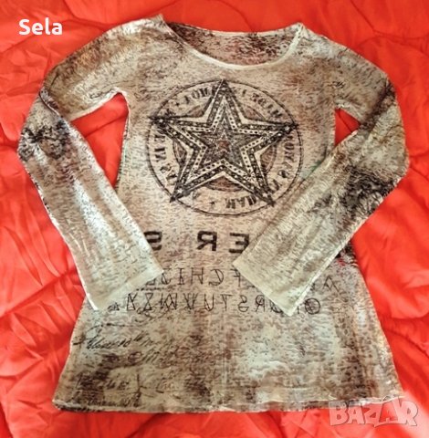 Актуална блузка в бяло с ефектни декорации