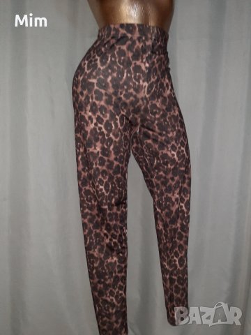 Janina 46/48 Еластичен клин анимал принт за едра дама 