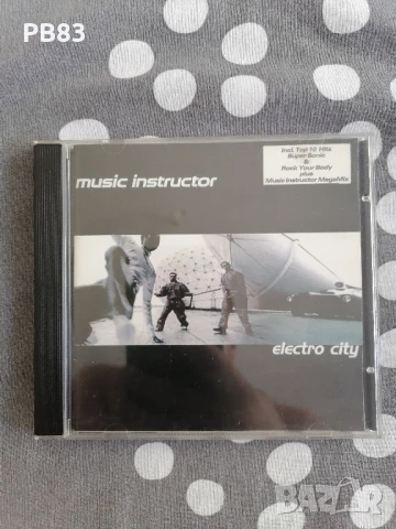 Music Instructor - Electric City CD