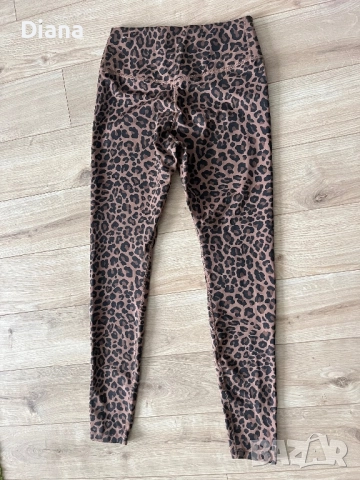 Оригинален дамски клин Nike DriFit, снимка 3 - Клинове - 52319690