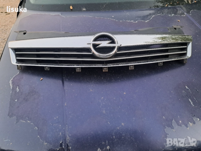 Фейсова решетка за Опел Астра Н с здрави захвати , снимка 2 - Части - 51859507